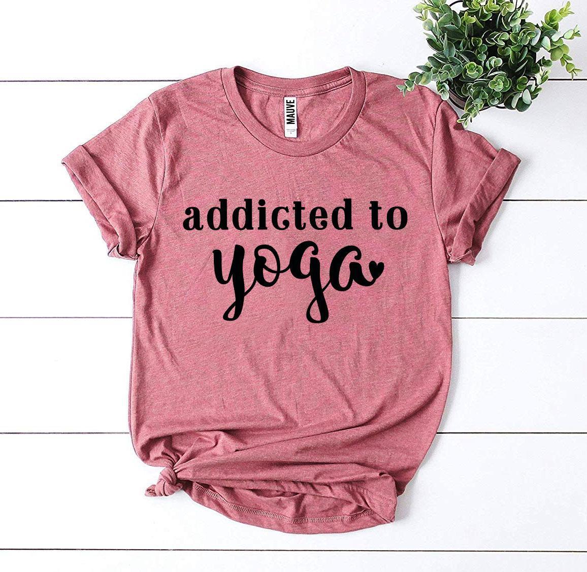 Addicted To Yoga T-shirt made of premium ring spun cotton, featuring a soft textile flex print design, available in various sizes.