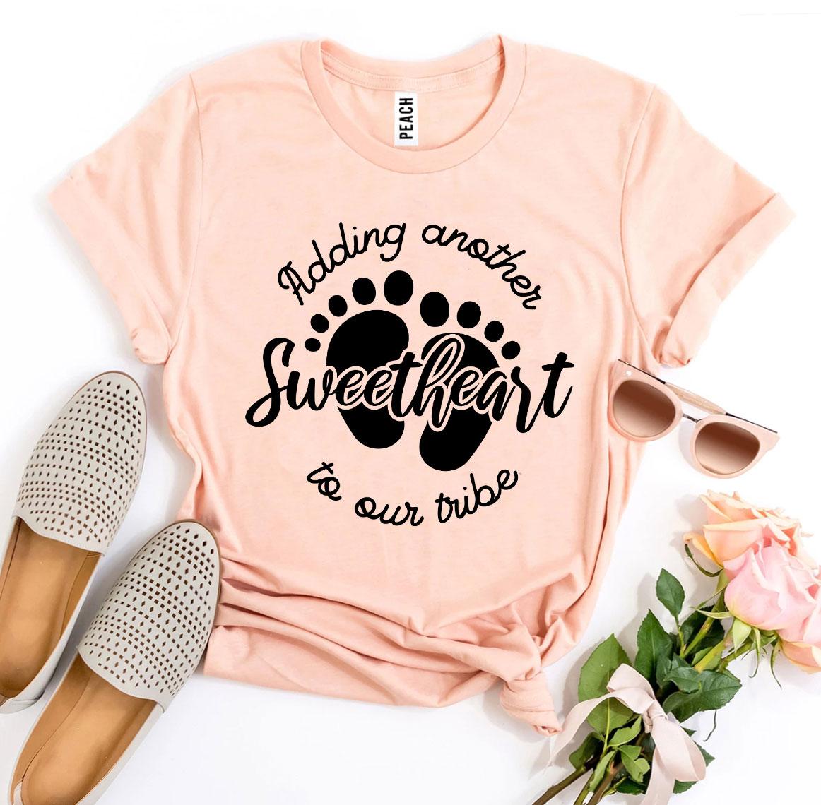 Adding Another Sweetheart To Our Tribe T-shirt made of premium ring spun cotton, featuring a vibrant flex print design.