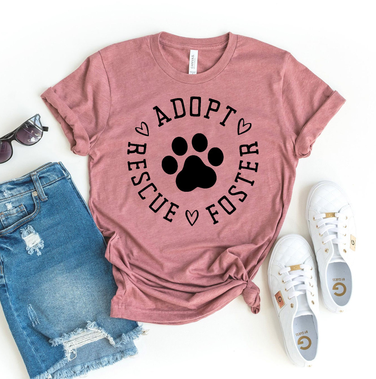 Adopt Rescue Foster T-shirt made of premium ring spun cotton, featuring a striking design promoting animal rescue and fostering.