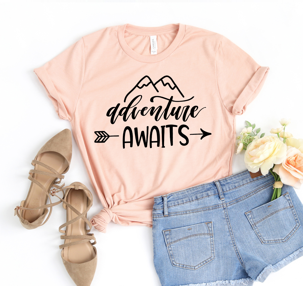 Adventure Awaits T-shirt featuring a stylish design, made from soft airlume cotton, available in various sizes.