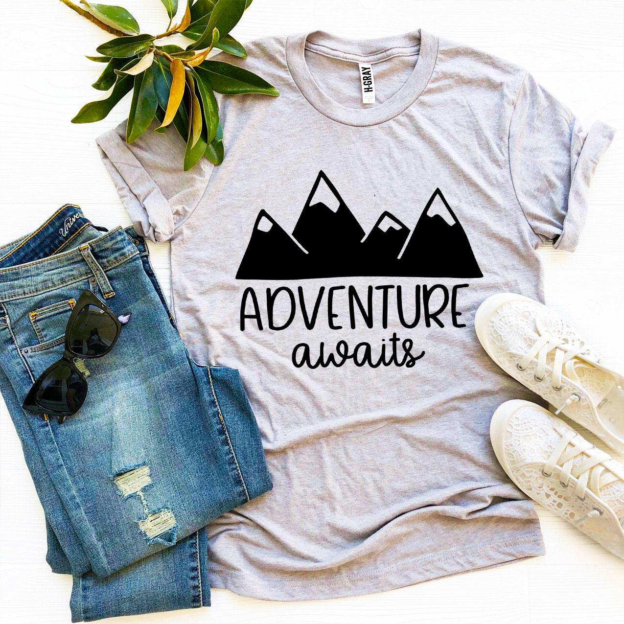 Adventure Awaits T-shirt made of premium ring spun cotton with a vibrant flex print design, available in various sizes.