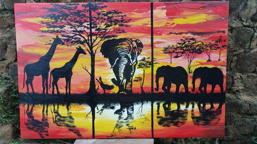 A vibrant handmade African canvas wall painting featuring intricate designs of African animals, framed and ready to hang.