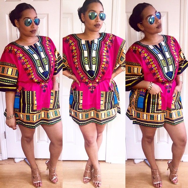 A vibrant pink African Dashiki Print Women Shirt made from 100% cotton, showcasing intricate patterns and a stylish design.