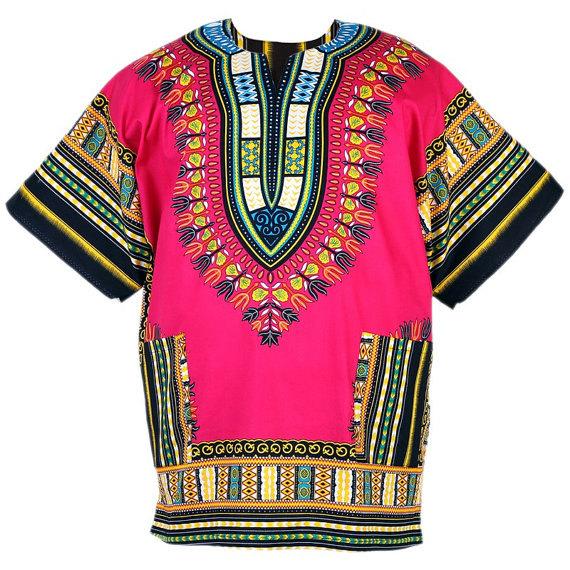 A vibrant pink African Dashiki Print Women Shirt made from 100% cotton, showcasing intricate patterns and a stylish design.