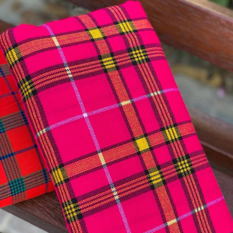 Vibrant African Maasai Shuka blanket showcasing colorful prints and elegant design, perfect for various uses.