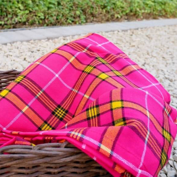 Vibrant African Maasai Shuka blanket showcasing colorful prints and elegant design, perfect for various uses.