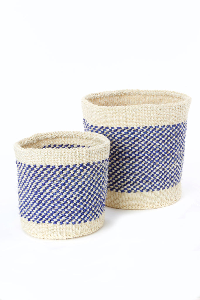 Handwoven African storage basket made from sisal grass, showcasing intricate patterns and natural colors, available in three sizes.