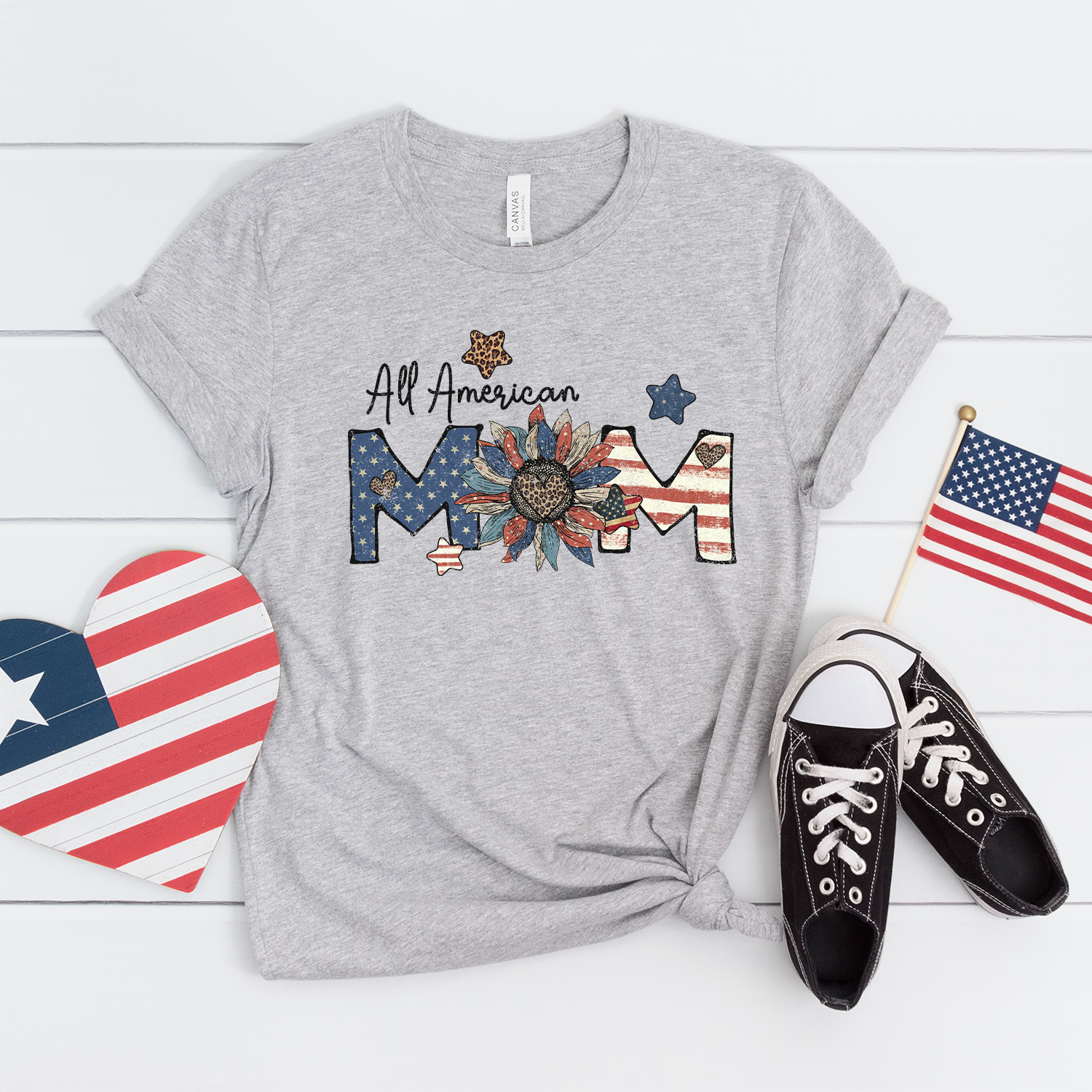 All American Mom Unisex T-shirt featuring vibrant design and comfortable fabric.