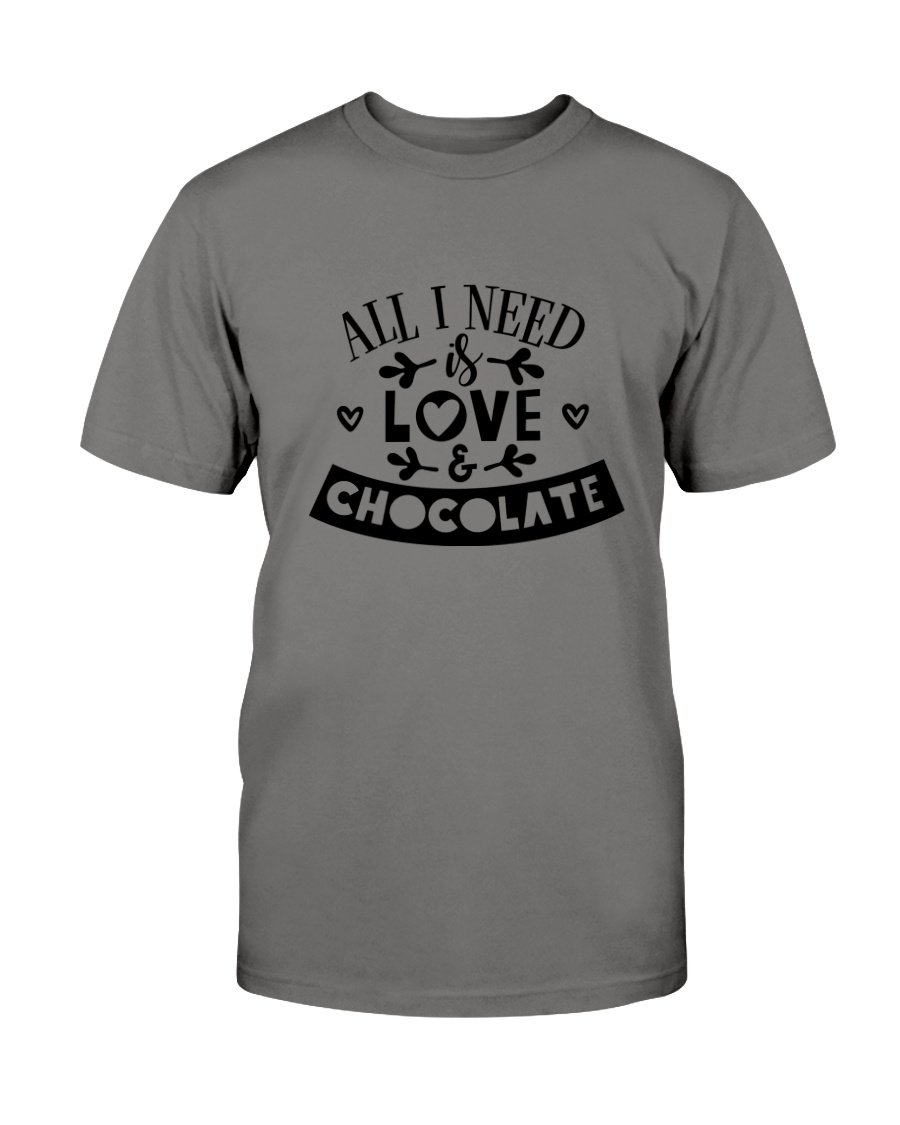 Unisex T-shirt featuring the phrase 'All I Need Is Love & Chocolate' in vibrant print, made from soft ring spun cotton.