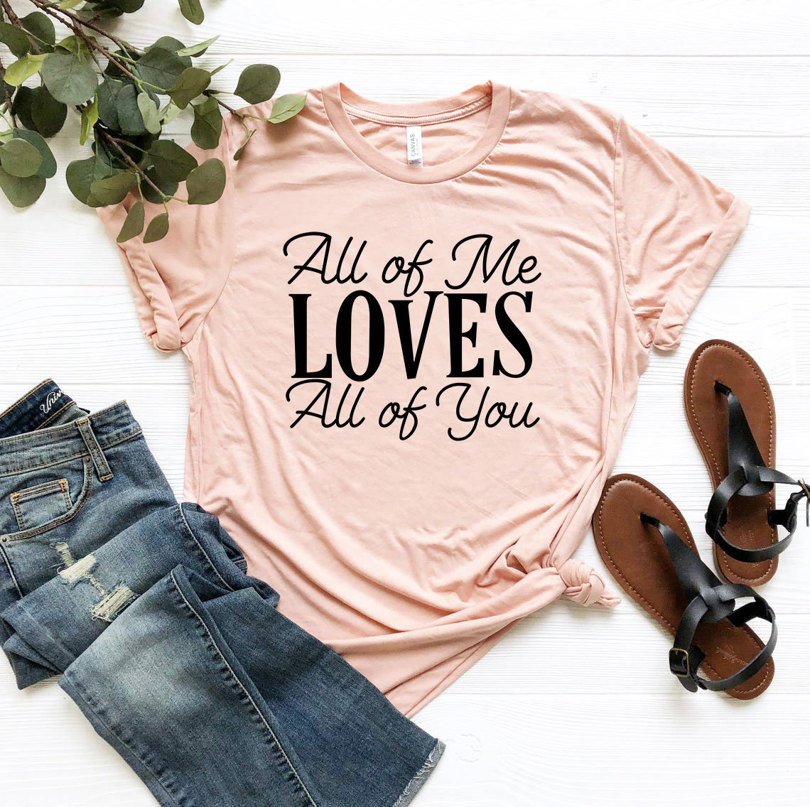 Unisex All Of Me Loves All Of You Shirt in various colors, showcasing its soft fabric and stylish design.