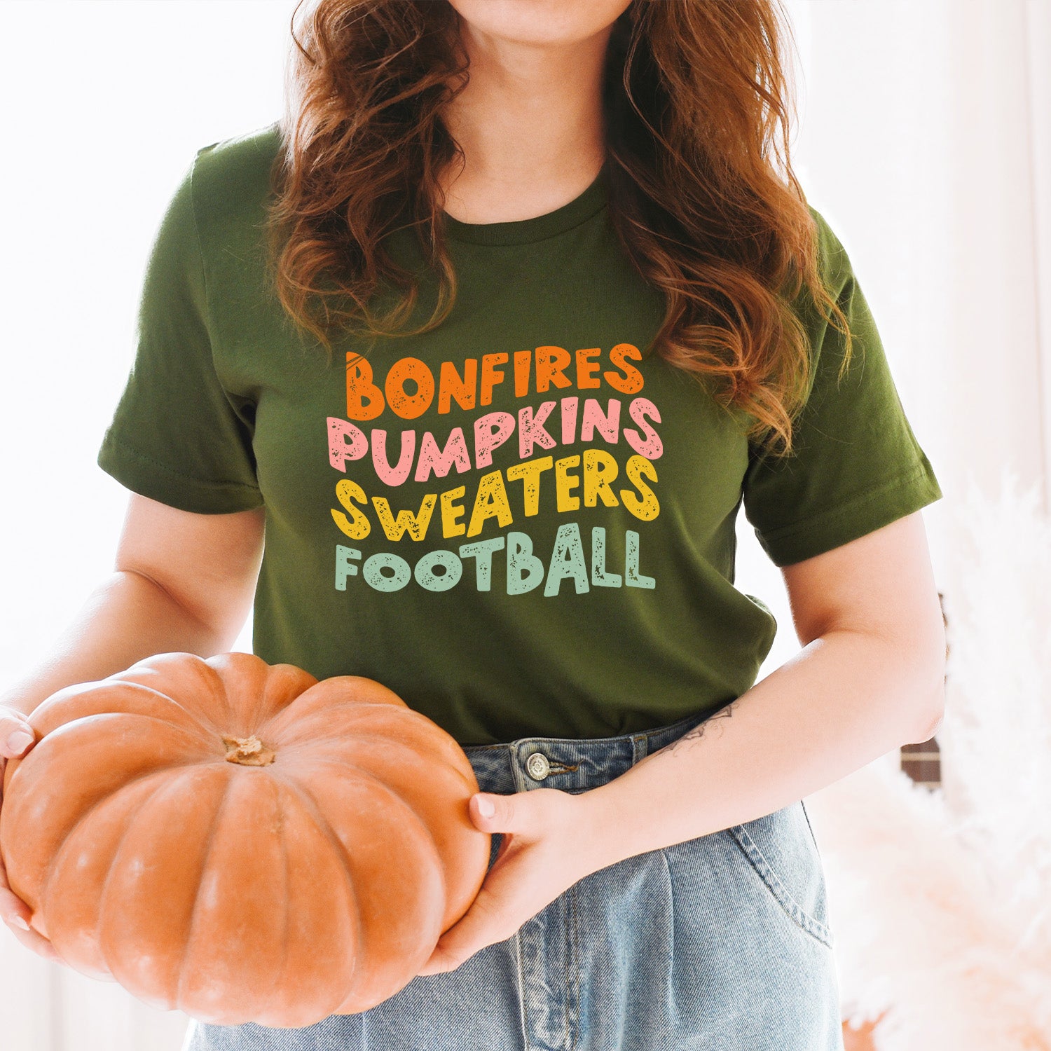 All the Fall Things Unisex T-shirt featuring vibrant autumn-themed design, perfect for cozy fall days.