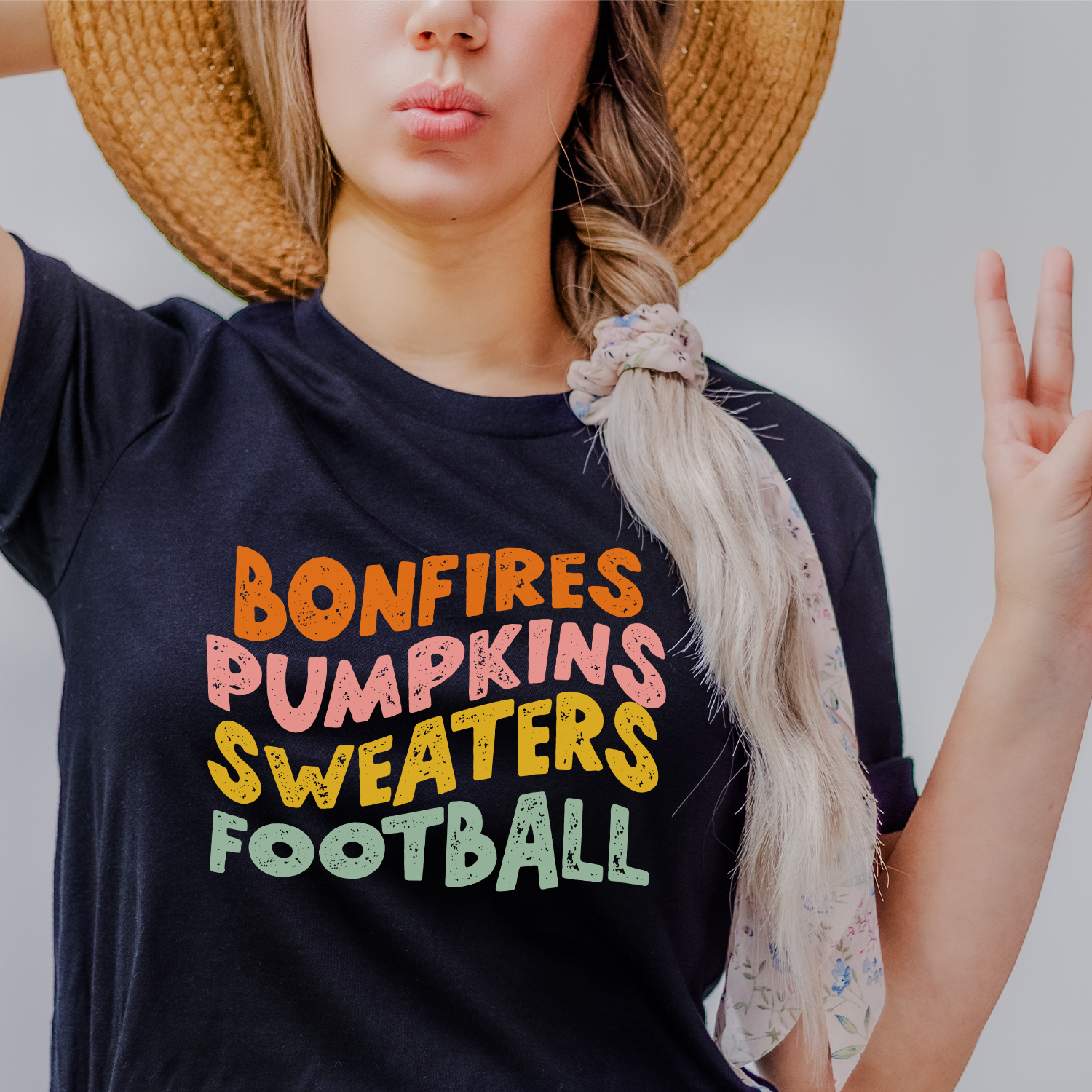 All the Fall Things Unisex T-shirt featuring vibrant autumn-themed design, perfect for cozy fall days.