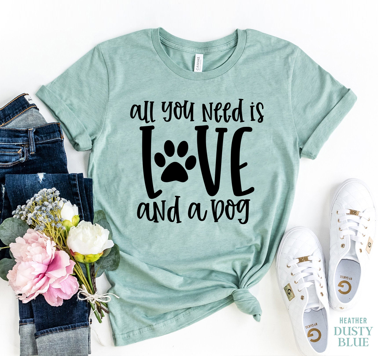 A stylish 'All You Need Is Love And A Dog' T-shirt made from premium ring spun cotton, featuring a vibrant flex print design.