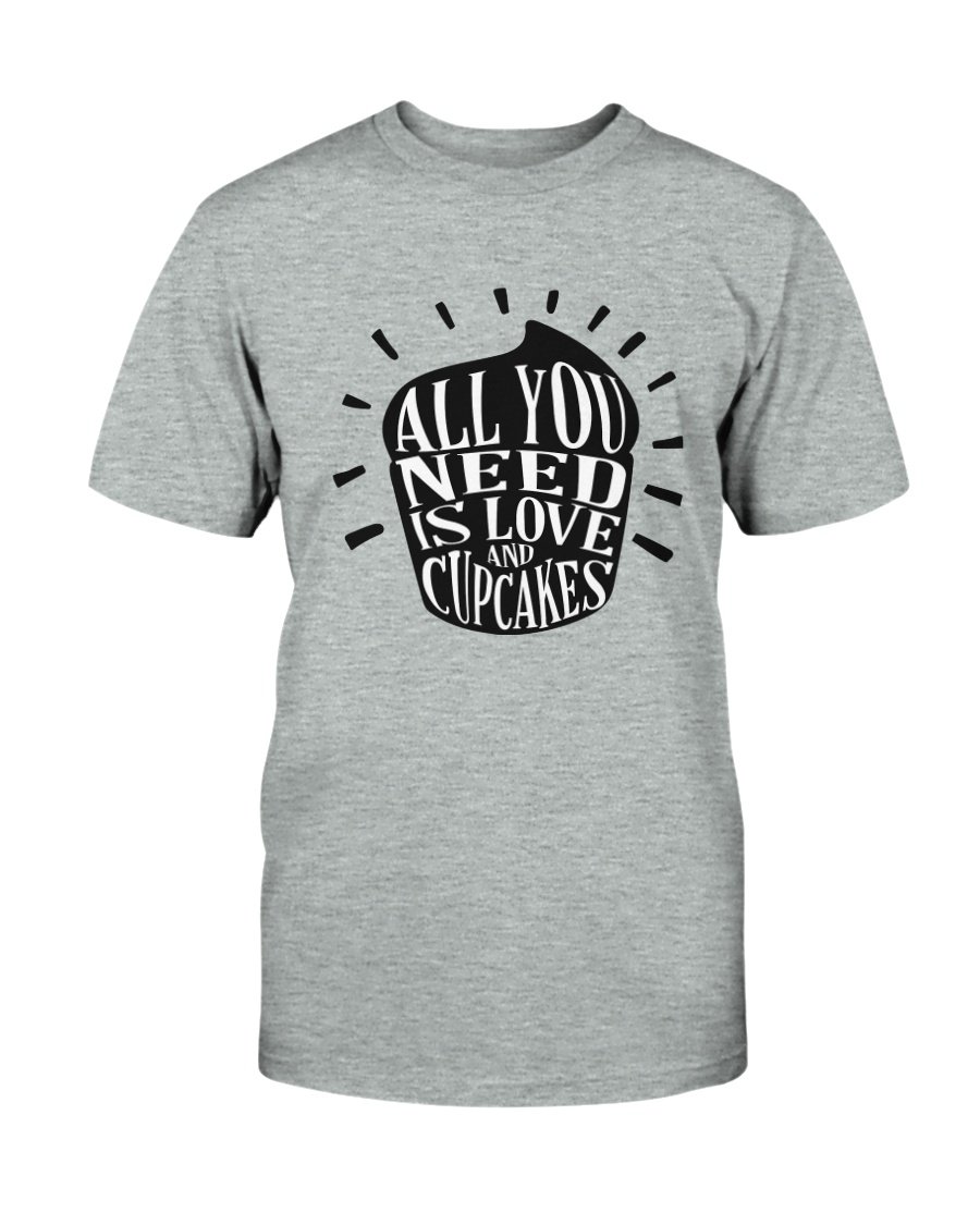 Unisex T-shirt featuring 'All You Need Is Love And Cupcakes' design, available in multiple colors and sizes.