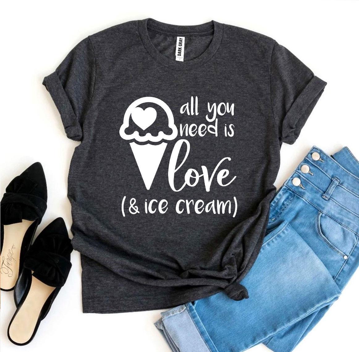 A stylish t-shirt featuring the phrase 'All You Need Is Love And Ice Cream' printed in vibrant colors on a soft fabric.