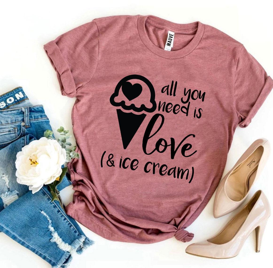 A stylish t-shirt featuring the phrase 'All You Need Is Love And Ice Cream' printed in vibrant colors on a soft fabric.