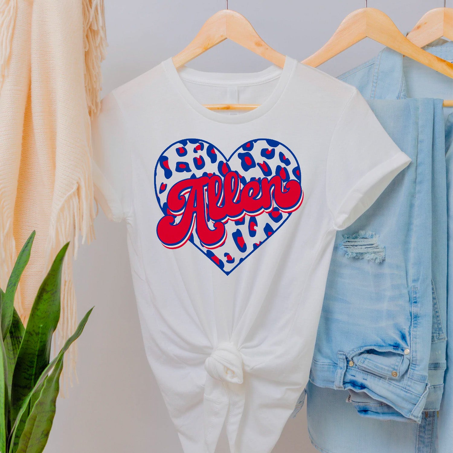 Allen Leopard Heart Unisex T-shirt featuring a vibrant leopard heart design on a soft fabric.