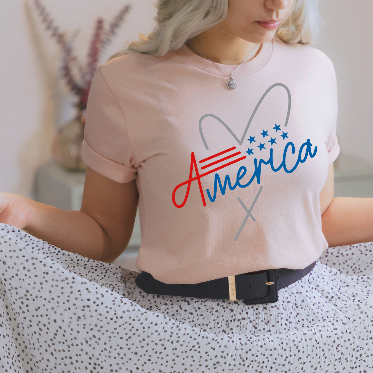 America Heart Unisex T-shirt featuring a vibrant heart design symbolizing love for the USA, displayed on a neutral background.