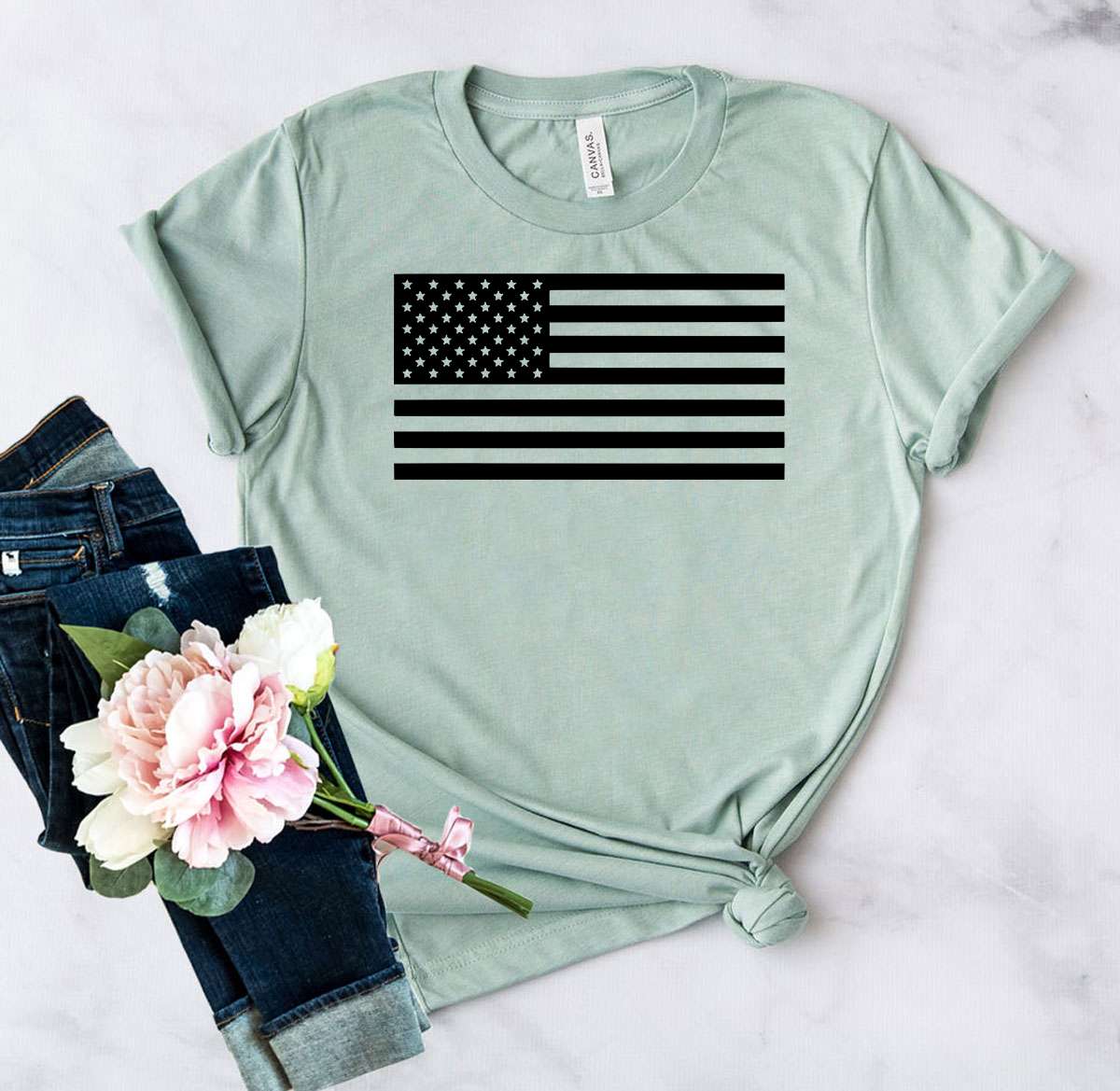 A comfortable unisex American Flag Shirt made from ring spun cotton, featuring a vibrant print of the American flag.