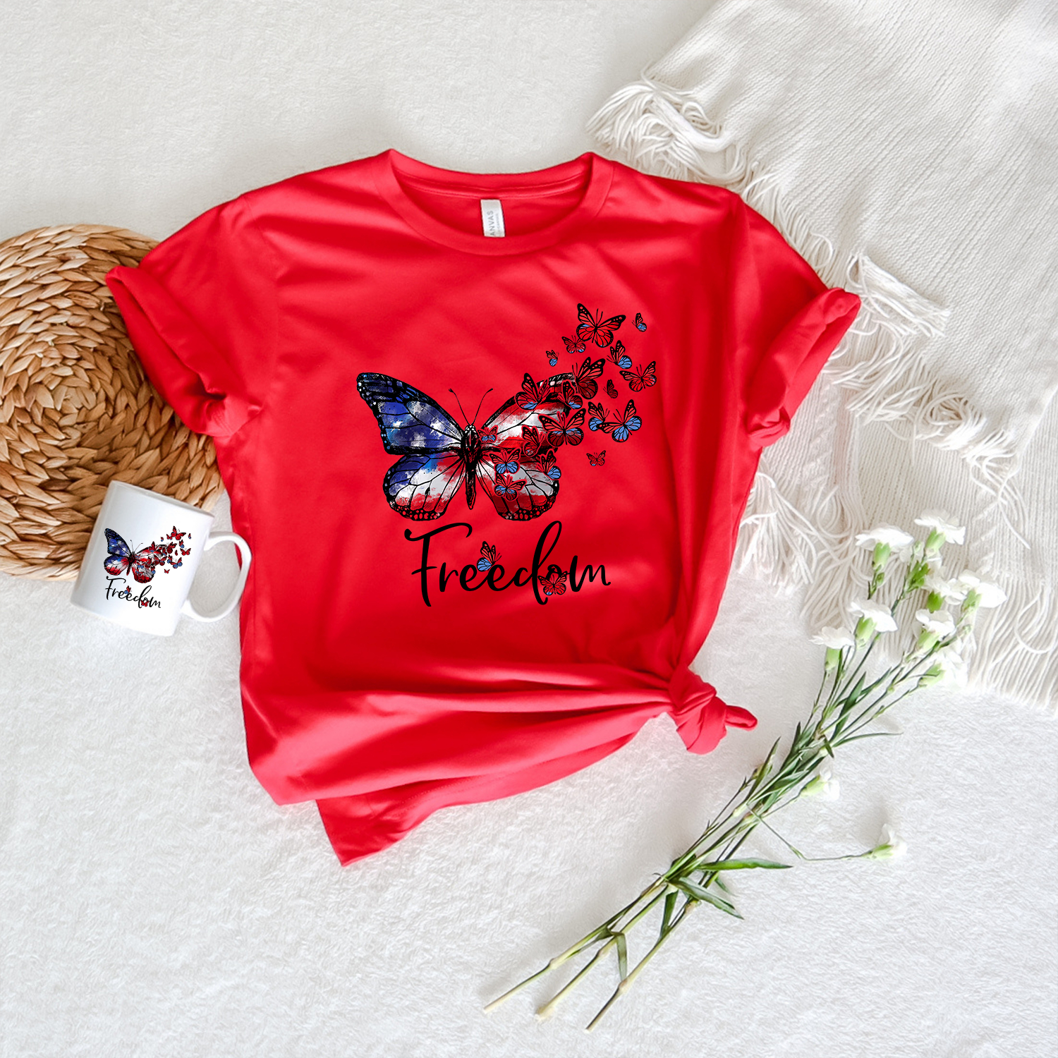 American Freedom Butterfly Unisex T-shirt featuring a vibrant butterfly graphic on a soft fabric.