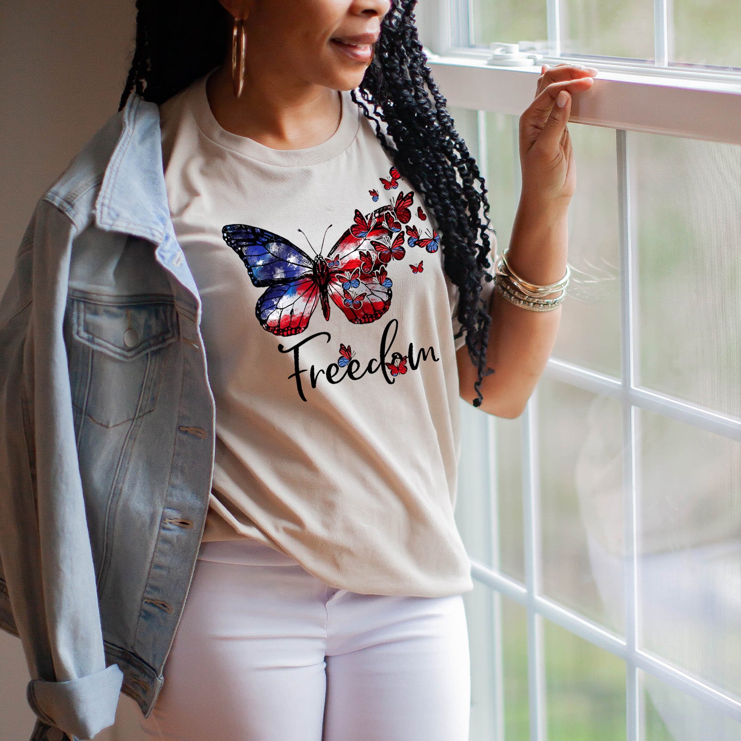 American Freedom Butterfly Unisex T-shirt featuring a vibrant butterfly graphic on a soft fabric.