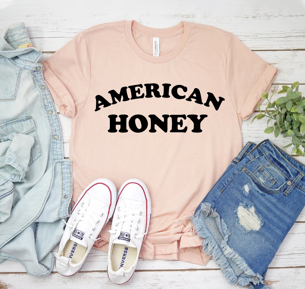 "American Honey t-shirt outfit laid"