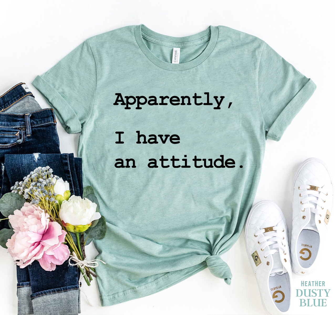 Apparently I Have An Attitude T-shirt in various sizes, showcasing its soft cotton fabric and humorous design.