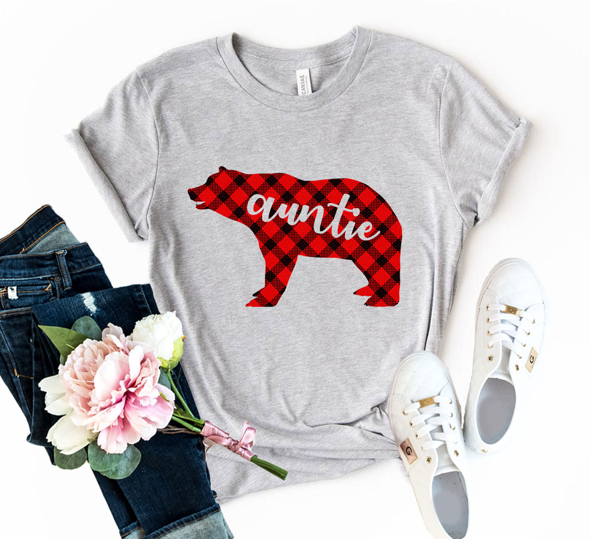 Auntie Shirt displayed in various colors, showcasing its soft fabric and classic crew neck design.