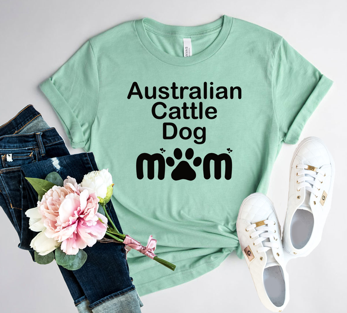 A stylish Australian Cattle Dog Mom shirt made from soft ring spun cotton, featuring a vibrant print and available in various colors.