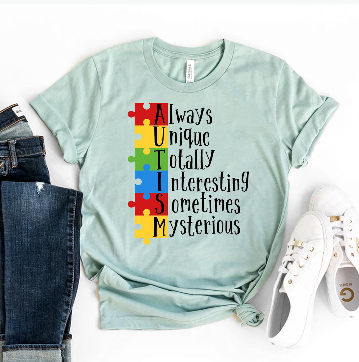 A stylish Autism T-shirt made from premium ring spun cotton, featuring a vibrant design and comfortable fit, available in various sizes.