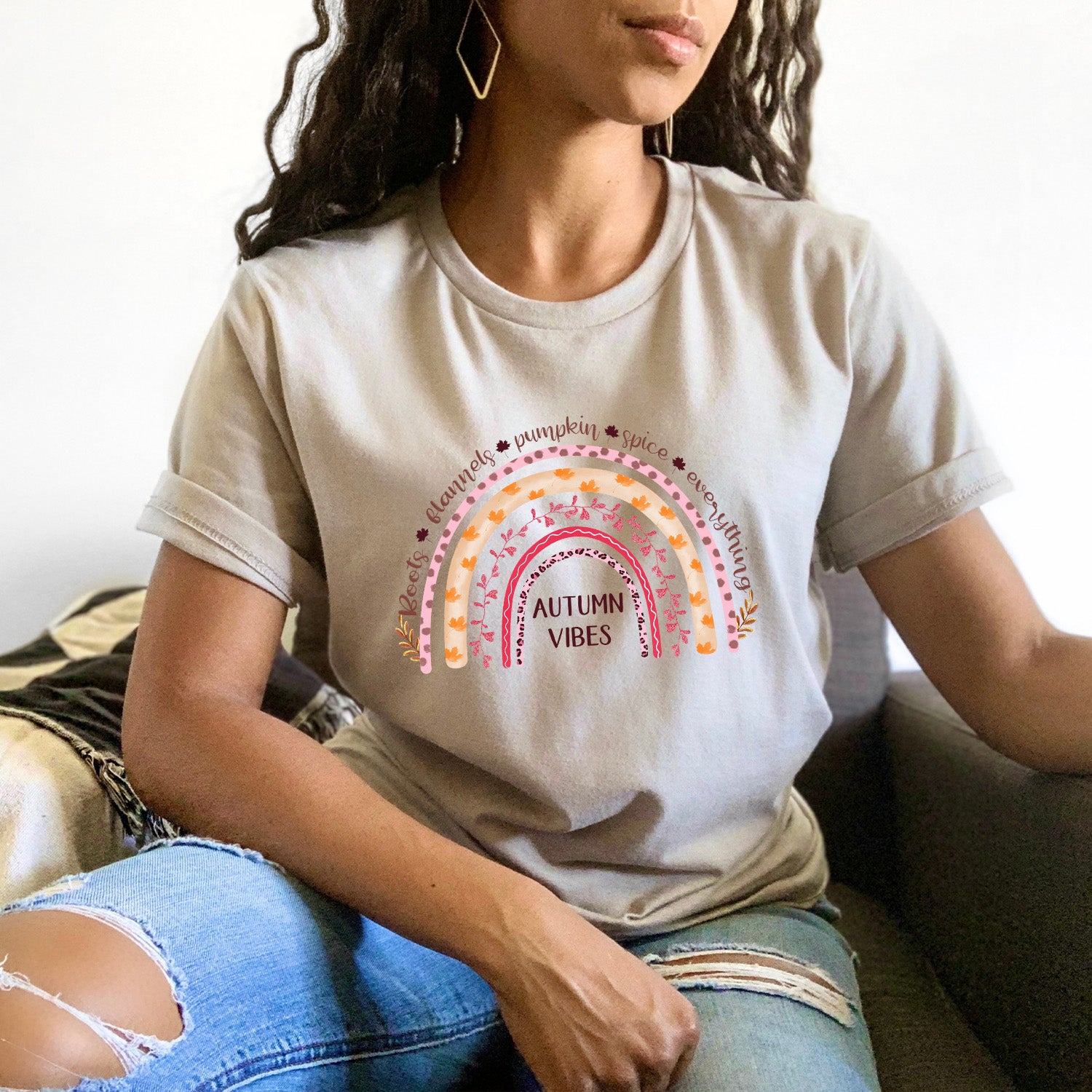 Autumn Vibes Rainbow Unisex T-shirt featuring a vibrant rainbow design, perfect for casual wear.