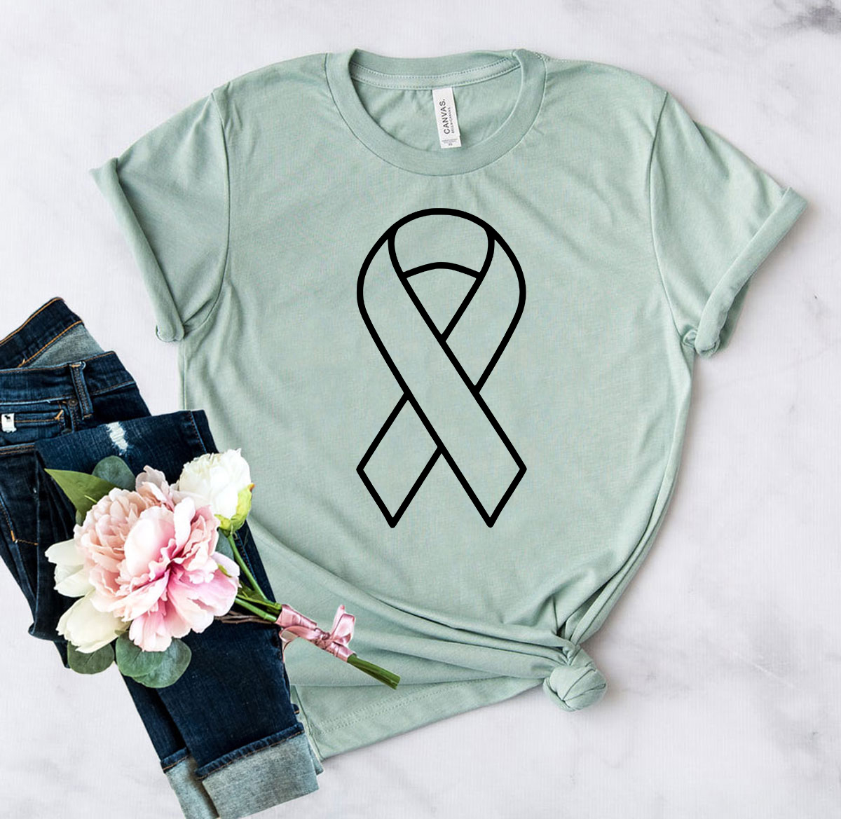 A unisex Awareness Ribbon Shirt made from soft ring spun cotton, available in multiple colors and sizes, featuring a crew neck and short sleeves.