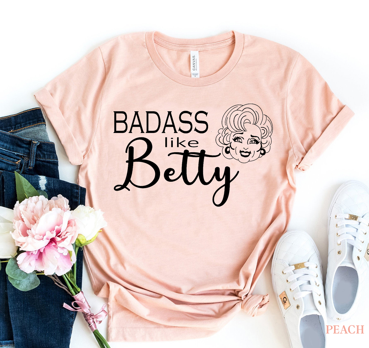 Badass Like Betty T-shirt in various sizes, showcasing premium quality ring spun cotton and vibrant flex print design.