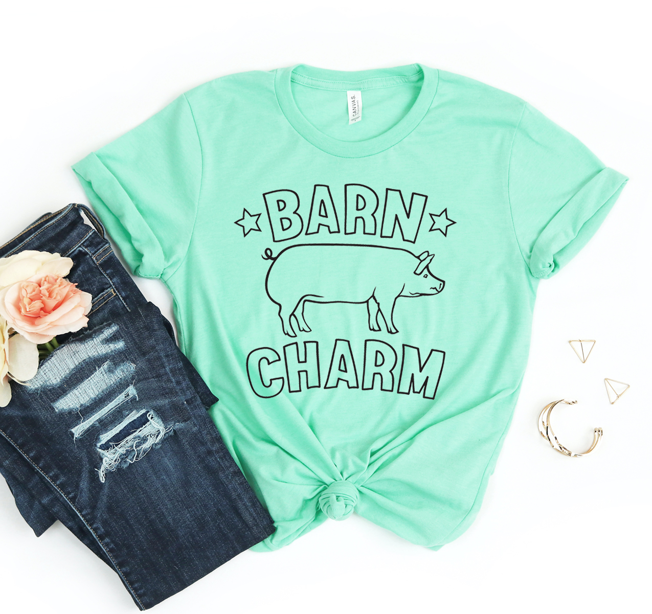 Barn Charm T-shirt in various sizes, showcasing its soft fabric and classic unisex design.