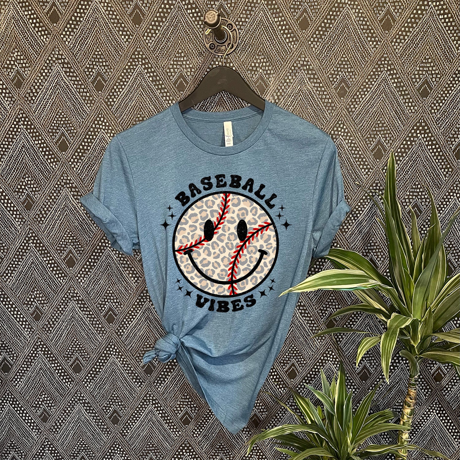 Baseball Vibes Smiley Face Unisex T-shirt featuring a vibrant smiley face design, perfect for baseball fans.