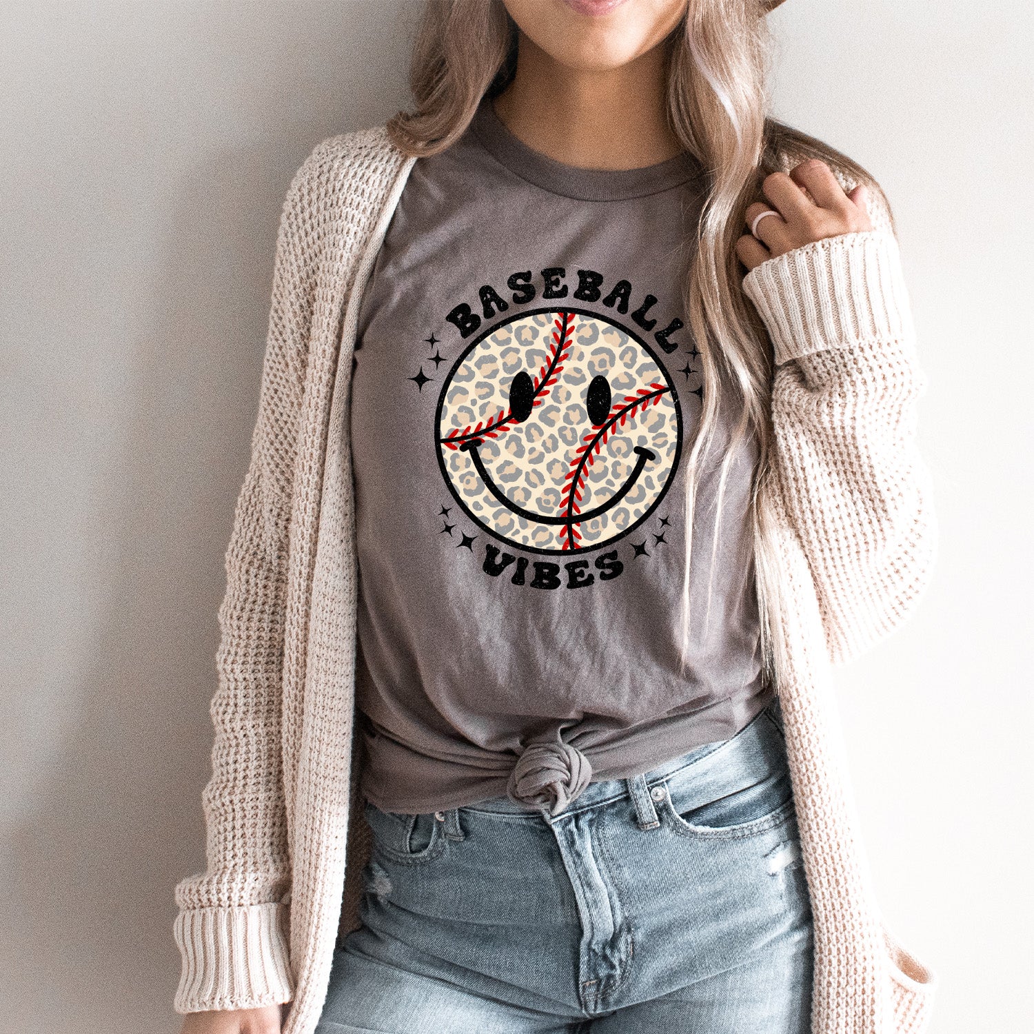 Baseball Vibes Smiley Face Unisex T-shirt featuring a vibrant smiley face design, perfect for baseball fans.