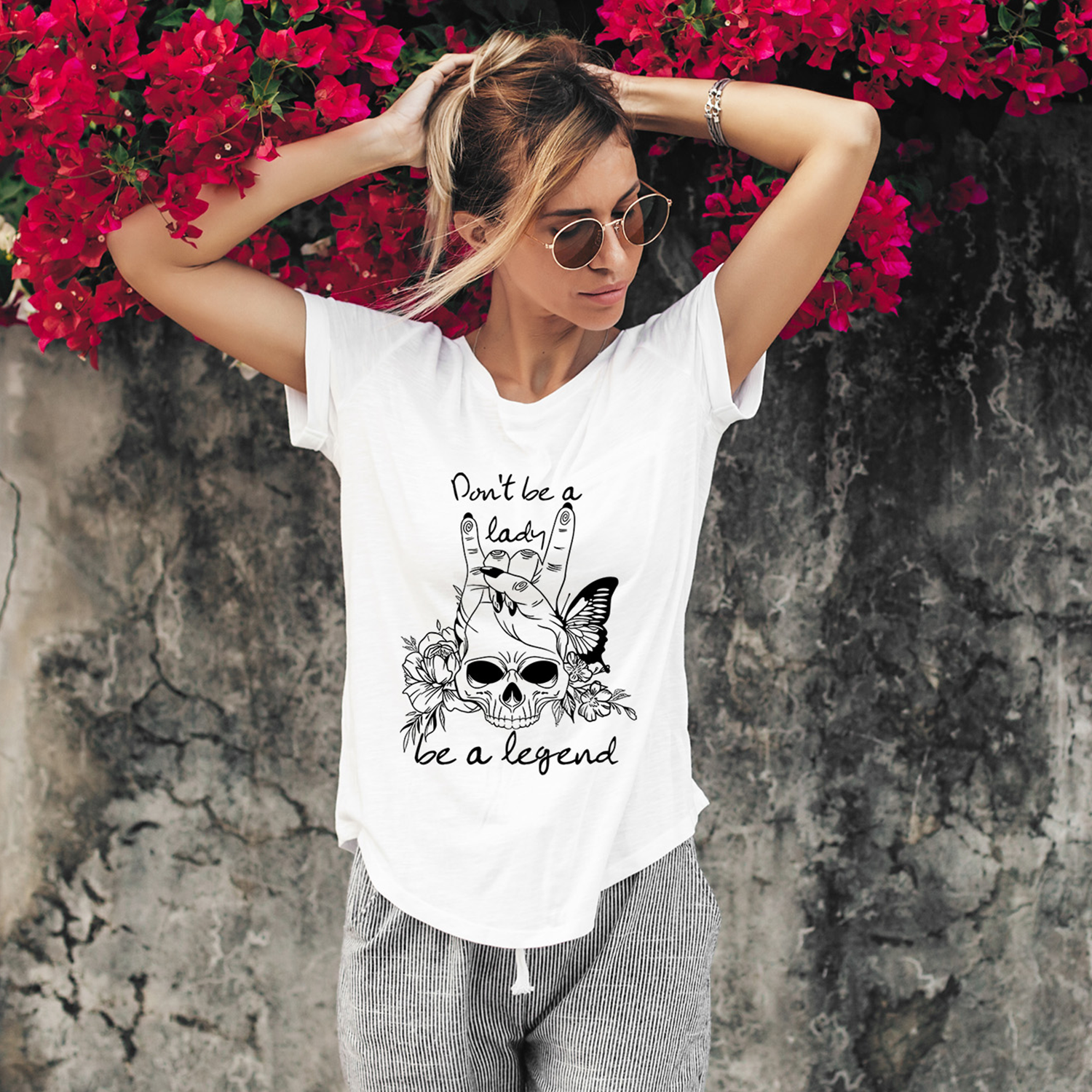 Be a Legend Skull Unisex T-shirt featuring a bold skull graphic, perfect for casual wear.