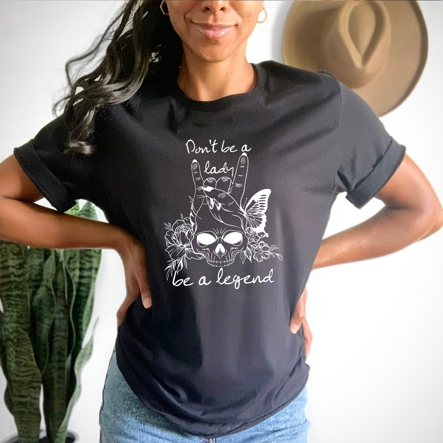 Be a Legend Skull Unisex T-shirt featuring a bold skull graphic, perfect for casual wear.