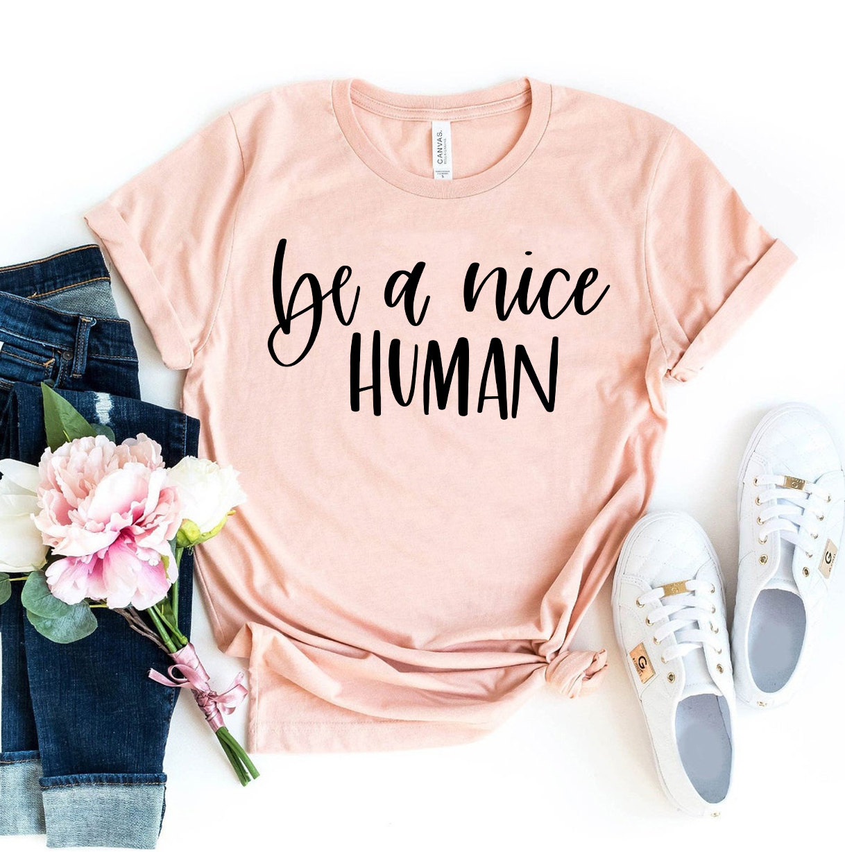 Be A Nice Human T-shirt made from premium ring spun cotton, featuring a soft textile flex print design in a comfortable retail fit.