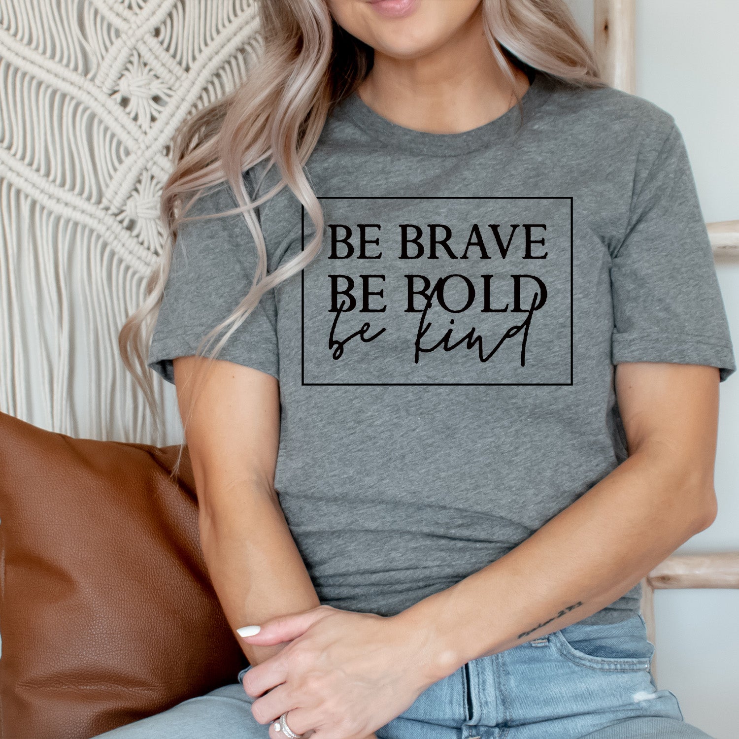 Be Bold Be Brave Be Kind Unisex T-shirt featuring a vibrant graphic design on a soft fabric.