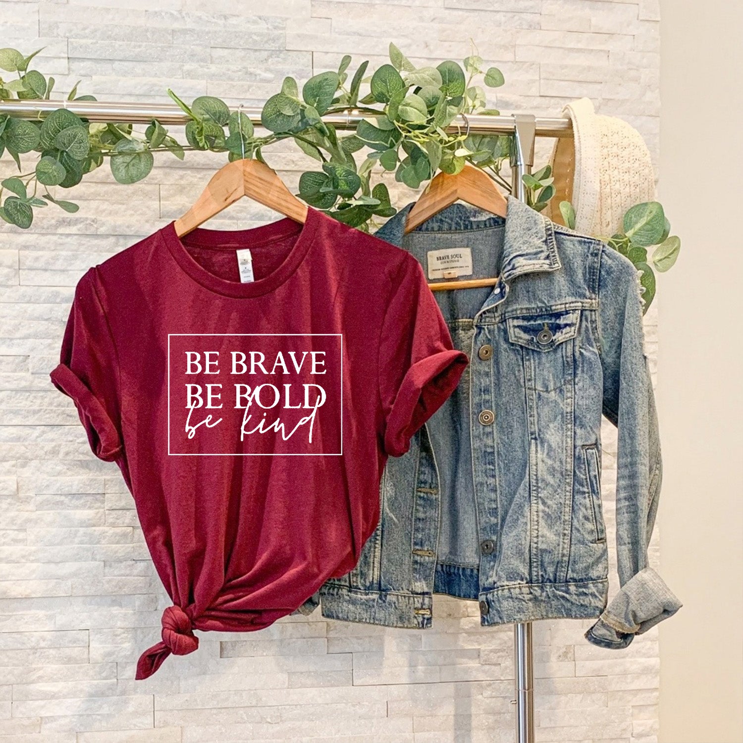 Be Bold Be Brave Be Kind Unisex T-shirt featuring a vibrant graphic design on a soft fabric.