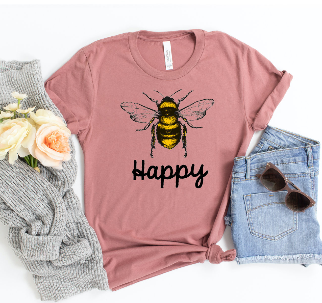 Bee Happy T-shirt featuring a classic unisex design in soft, breathable fabric, available in various sizes.