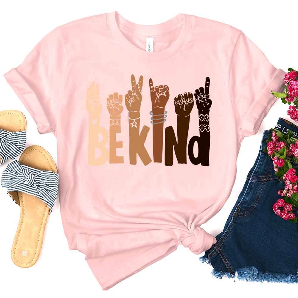 Be Kind T-shirt displayed on a mannequin, showcasing its soft fabric and unisex design in a vibrant color.