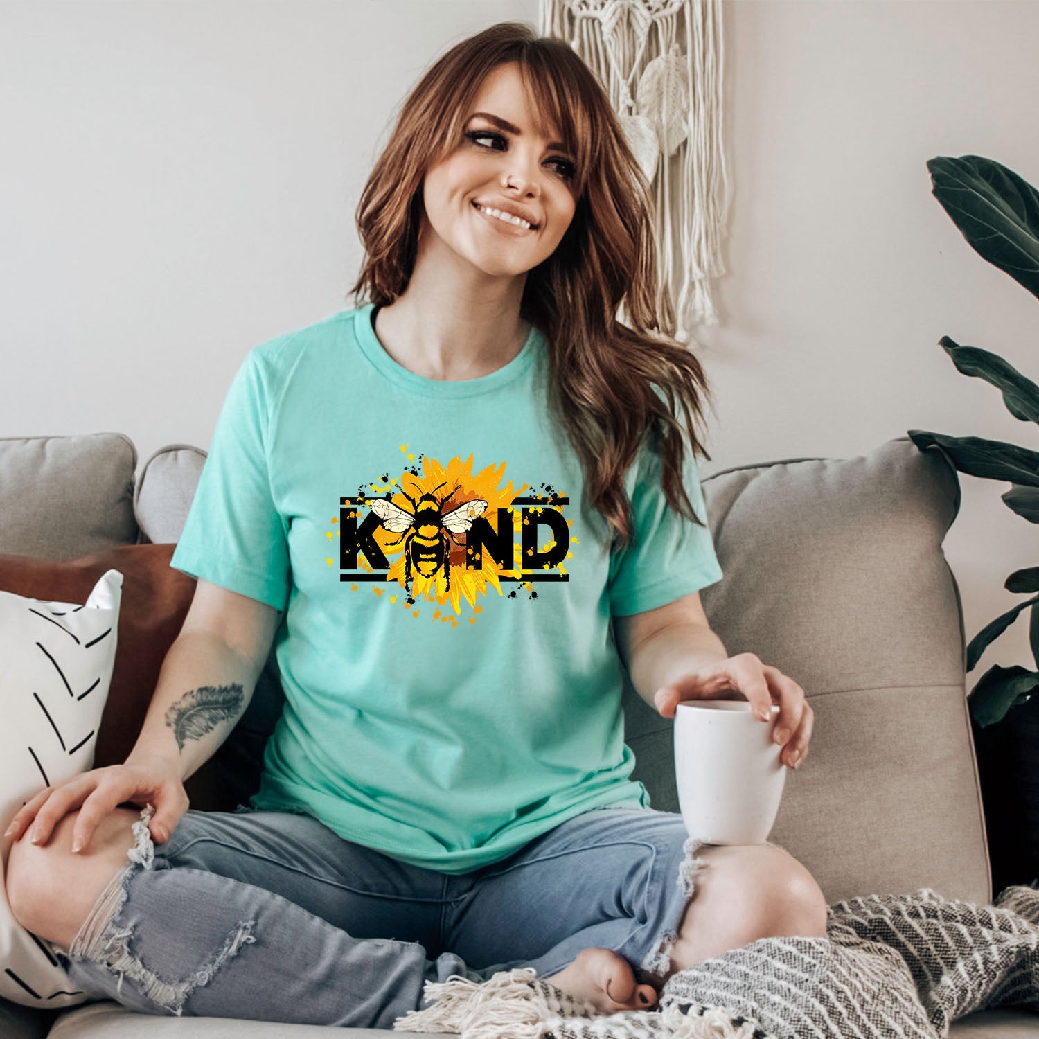 Bee Kind Unisex T-shirt featuring a vibrant design, perfect for casual wear.