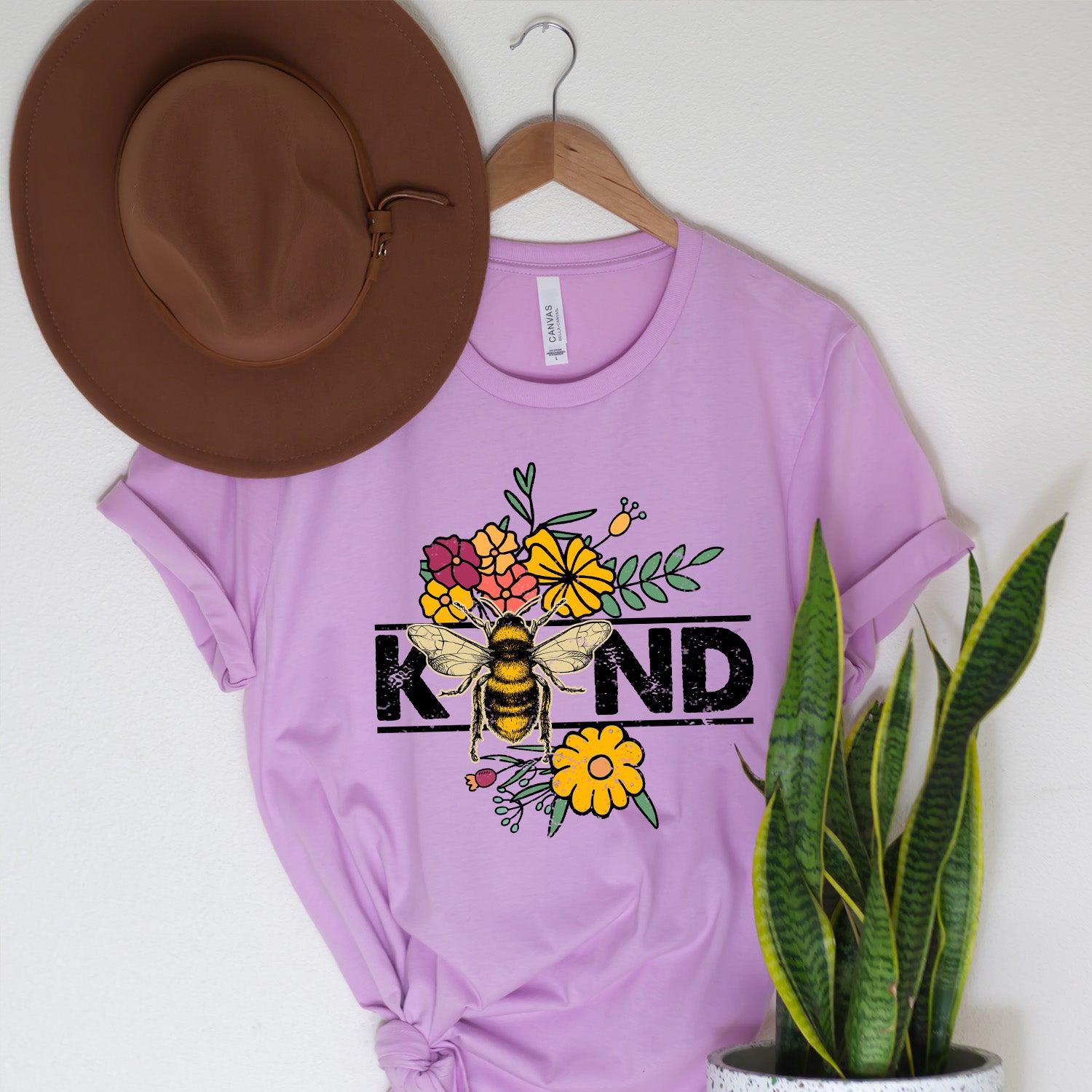 Bee Kind Wildflowers Unisex T-shirt featuring vibrant wildflower design on a soft fabric.