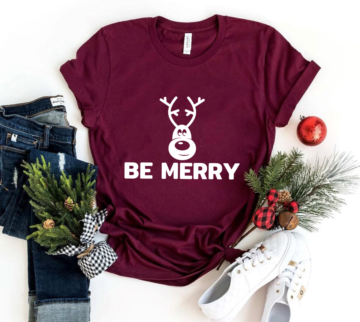 Be Merry Shirt in various colors, showcasing its soft fabric and stylish design.