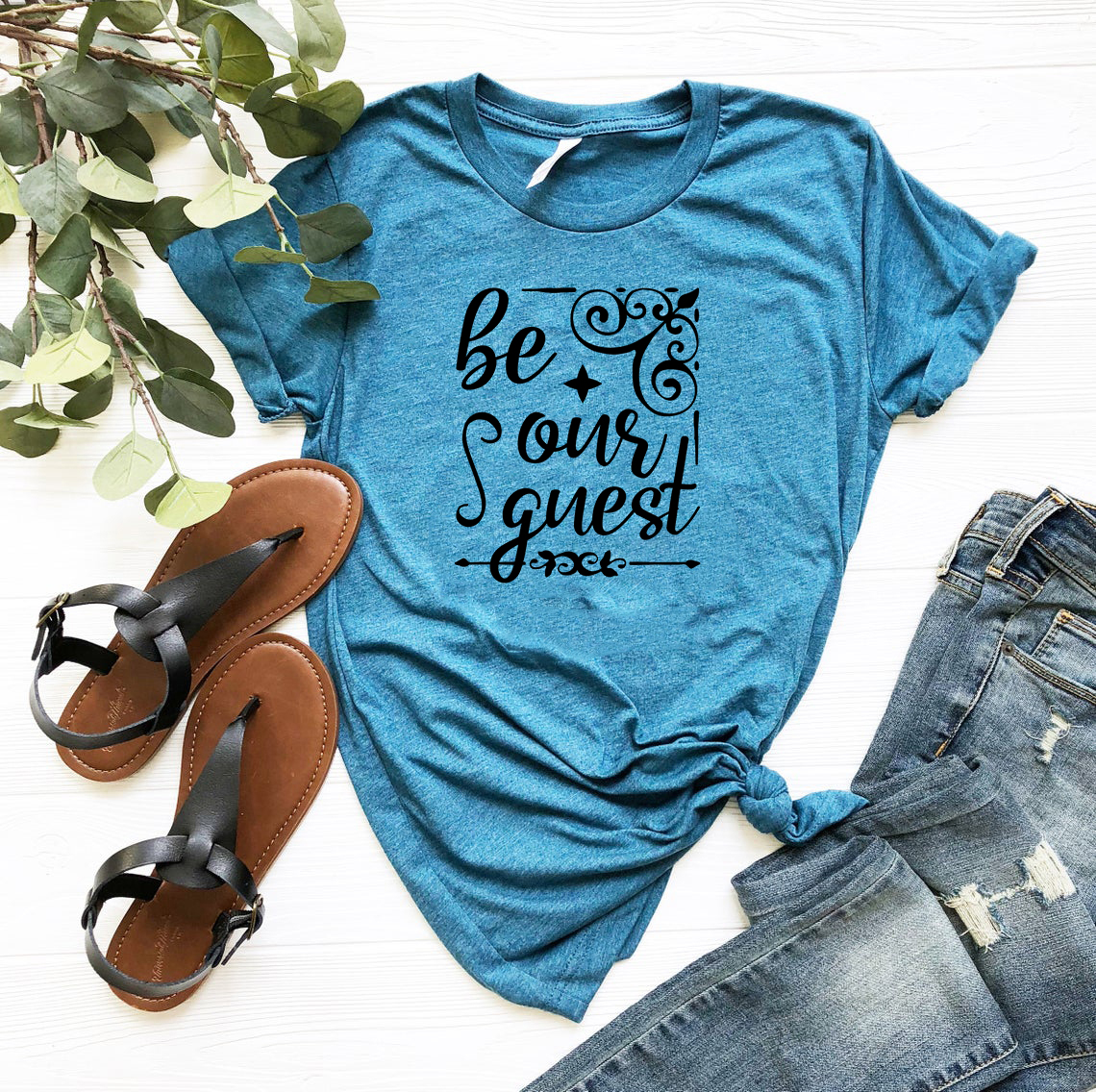 Be Our Guest Shirt in various colors, showcasing its soft fabric and stylish design.