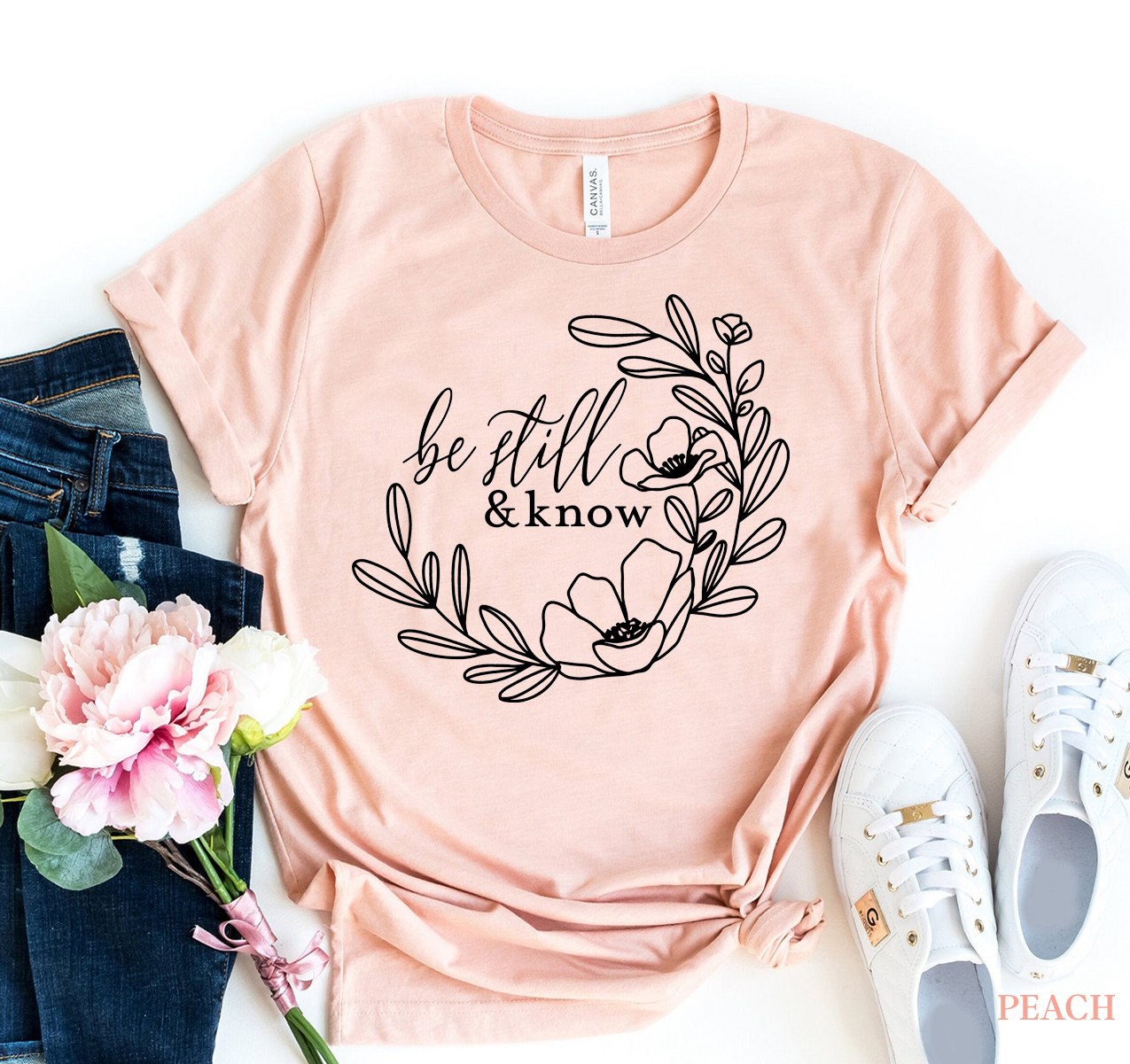 Be Still And Know T-shirt in various sizes, showcasing its soft fabric and unisex design.