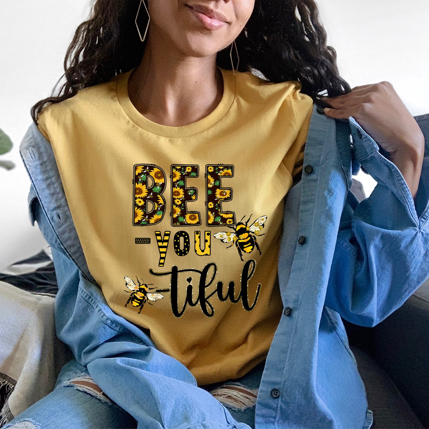 Bee You-tiful Sunflower Unisex T-shirt featuring a vibrant sunflower graphic on a soft fabric.