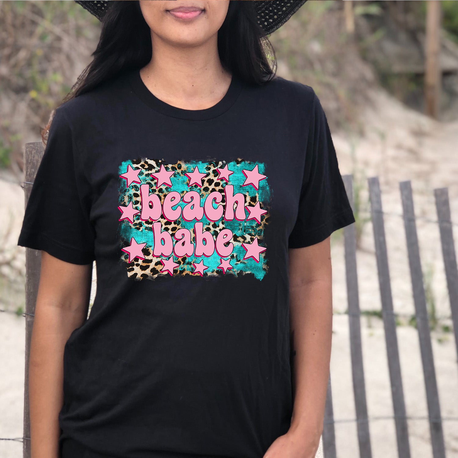 Beach Babe Unisex T-shirt featuring vibrant graphics, perfect for summer outings.